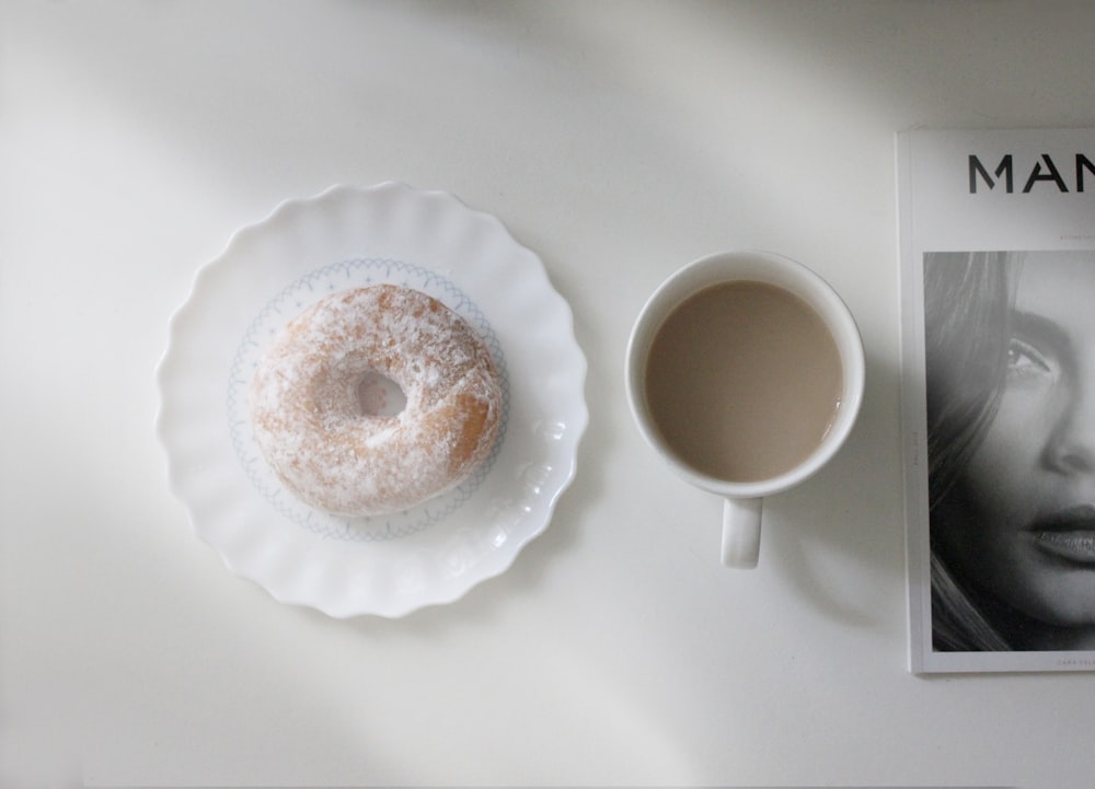 white ceramic mug on white round plate