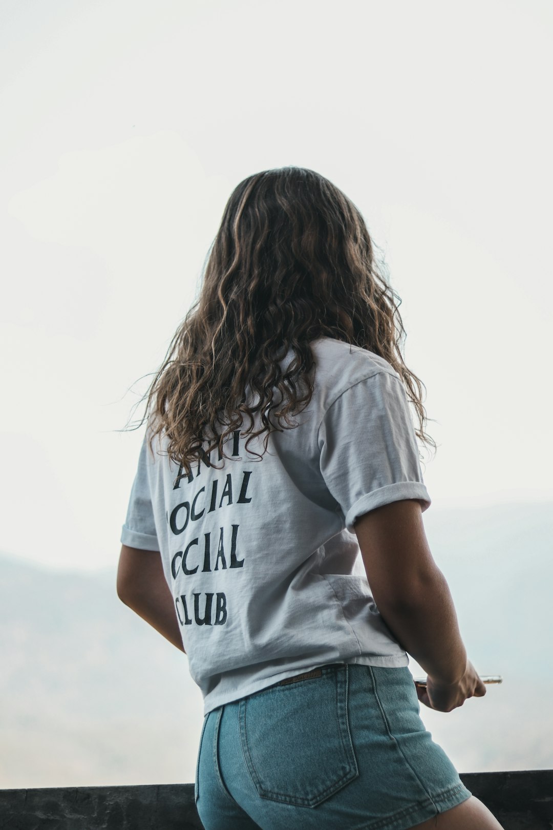 woman in white and black t-shirt