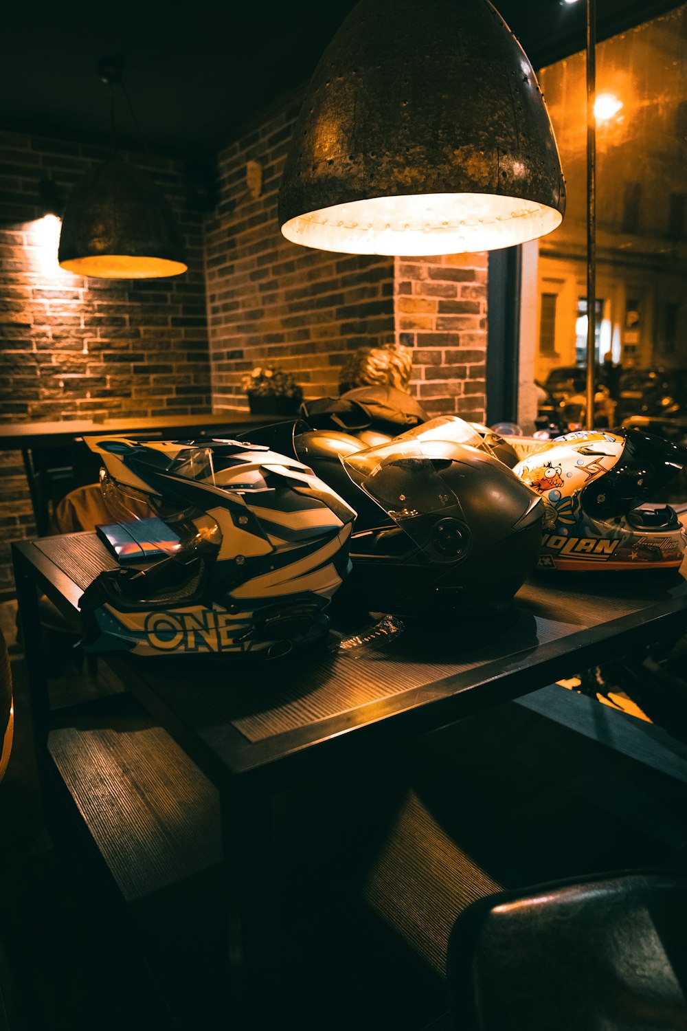 black and white helmet on black wooden table