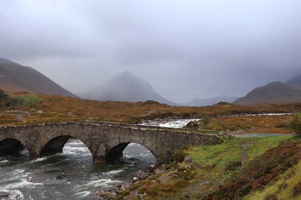 brown concrete bridge over river