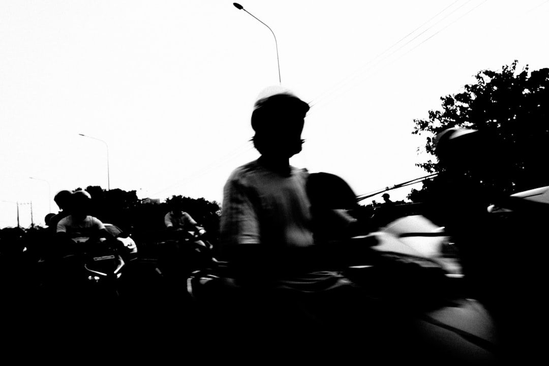 grayscale photo of man in white crew neck shirt