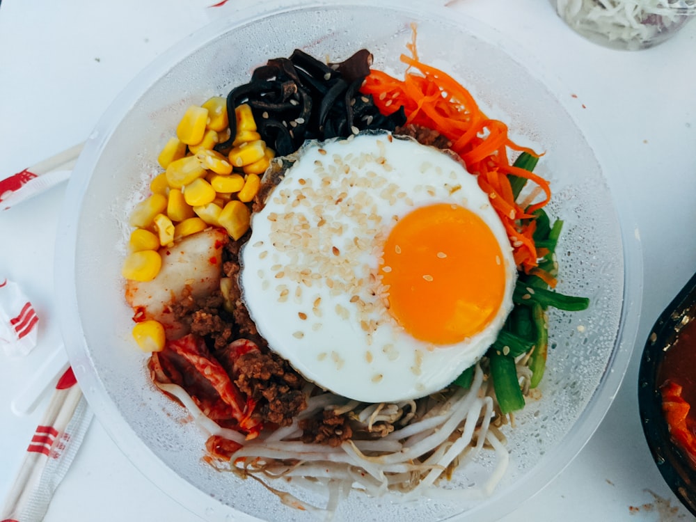 egg and vegetable salad on white ceramic plate