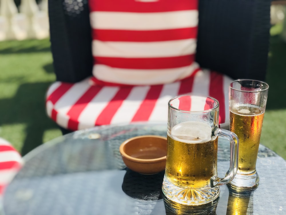 clear glass mug with beer