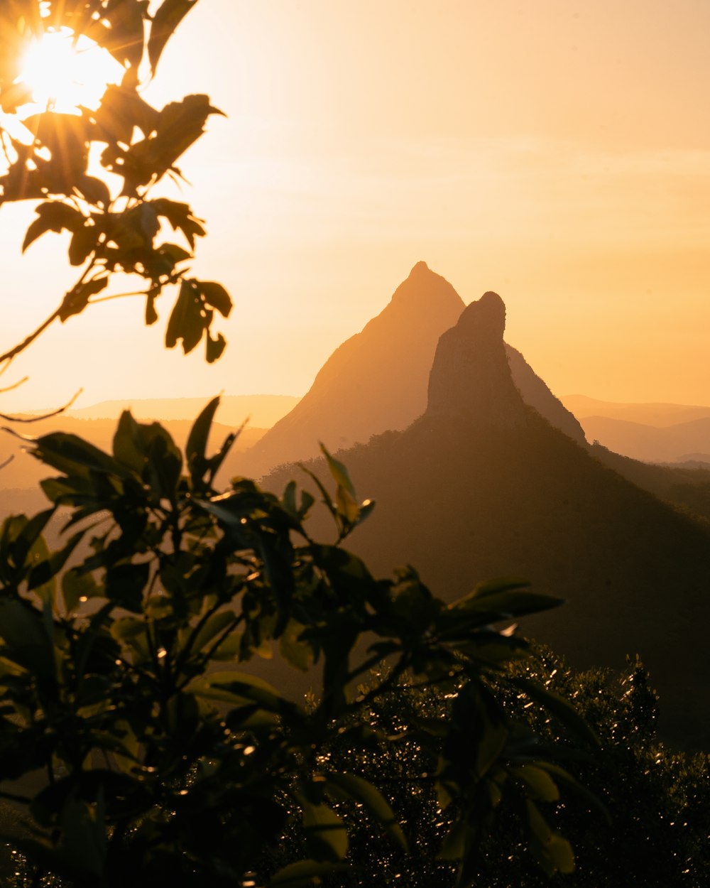 silhouette of mountain during sunset