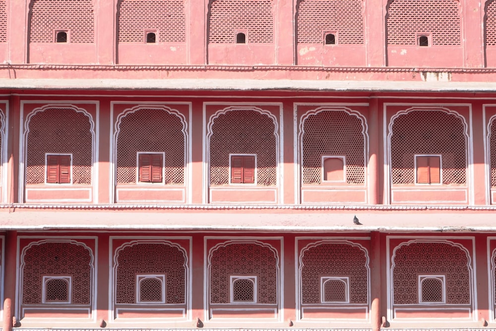 pink and white concrete building