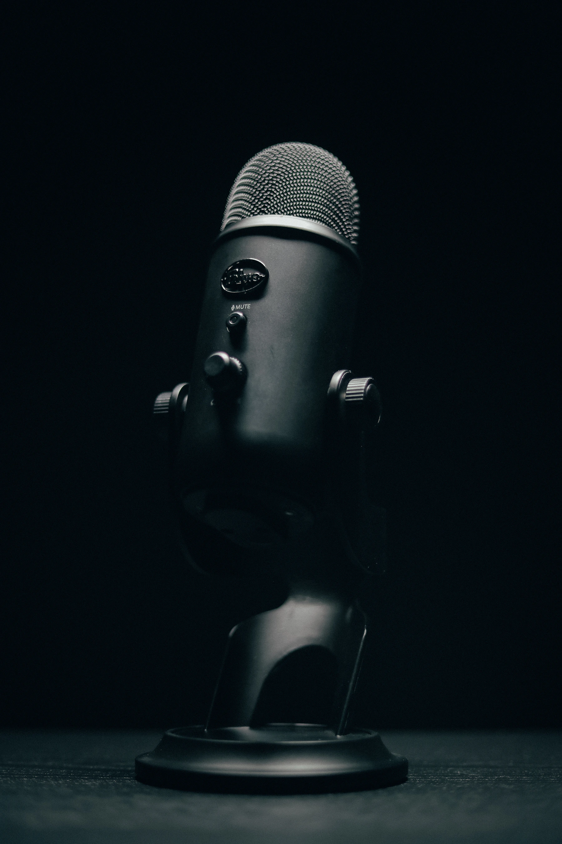 Professional podcast microphone in a recording studio