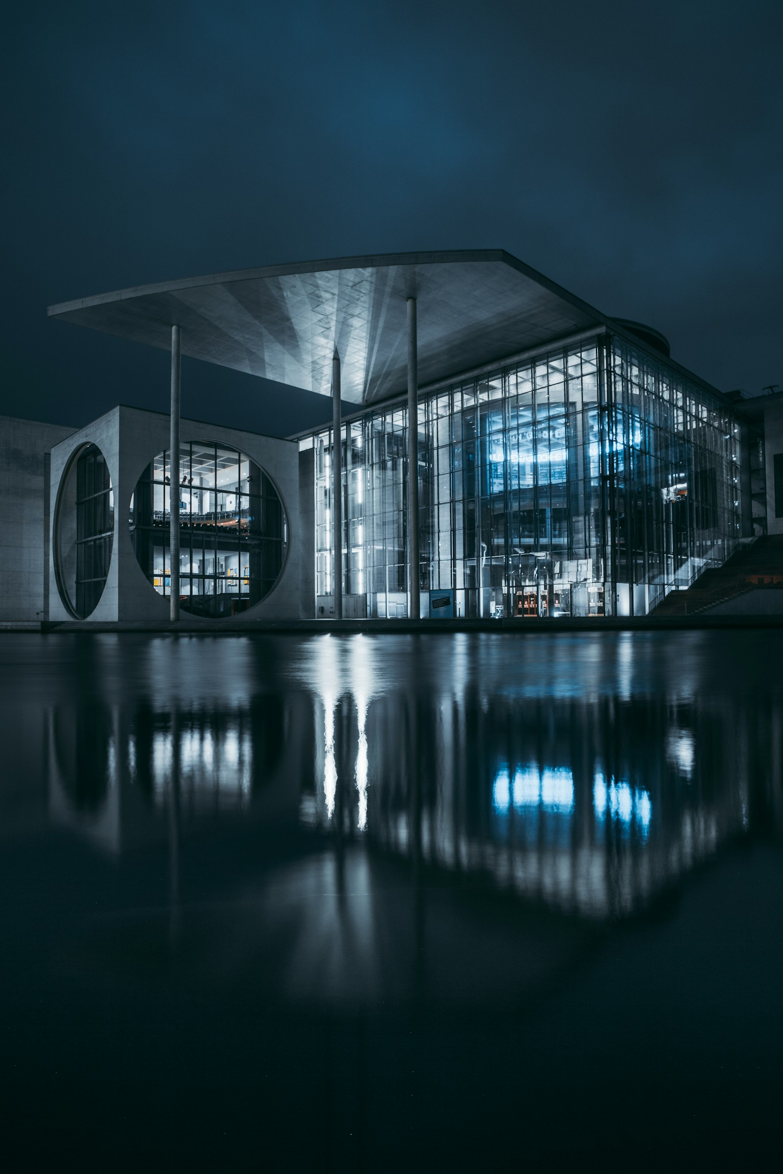 ZEISS Touit 12mm F2.8 sample photo. Clear glass building near photography