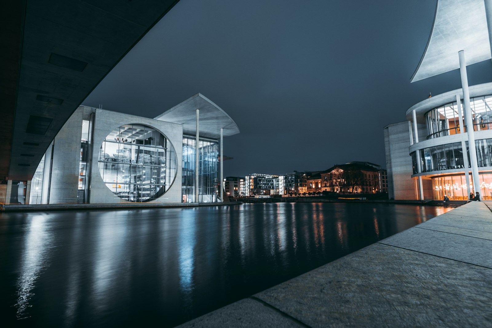 ZEISS Touit 12mm F2.8 sample photo. Clear glass building near photography