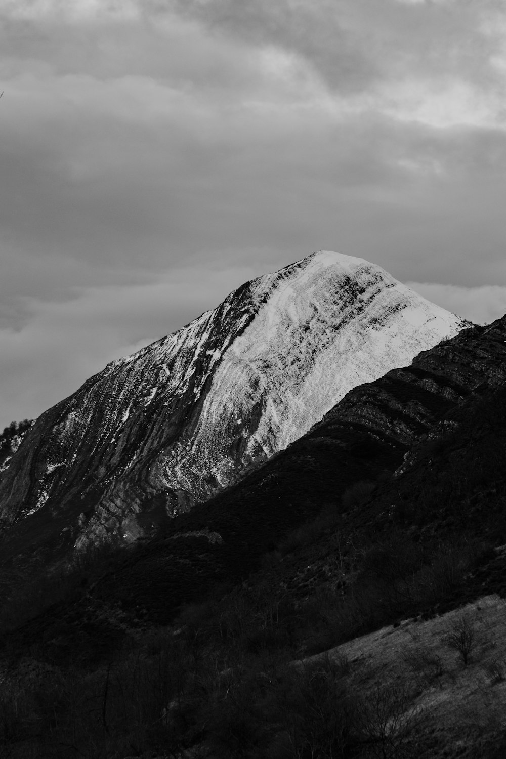 grayscale photo of mountain range