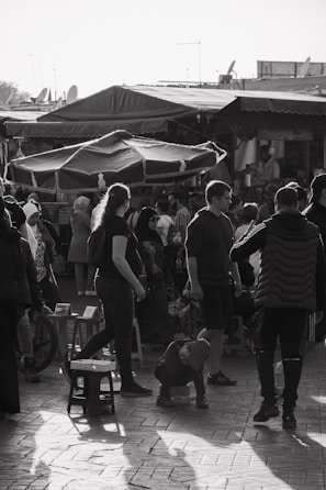 An urban scene with people interacting in a lively market.
