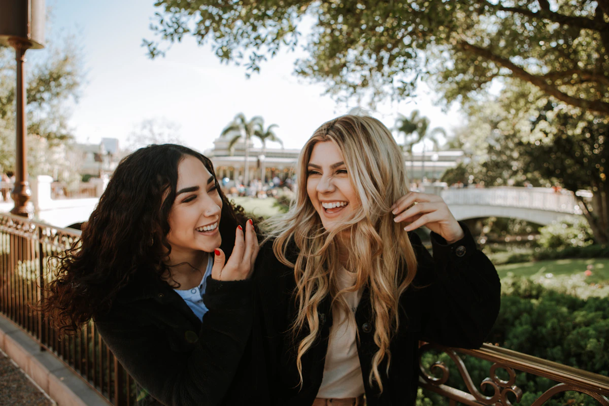 Two smiling creators
