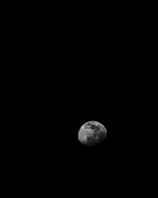 High contrast image of Mars with visible atmospheric details, set against the ultra-detailed lunar foreground.