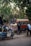 Photo of a vibrant food cart with customers enjoying snacks in Pune.
