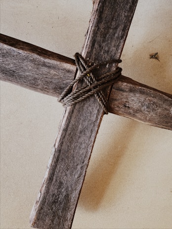 rope lashing on wooden Cross