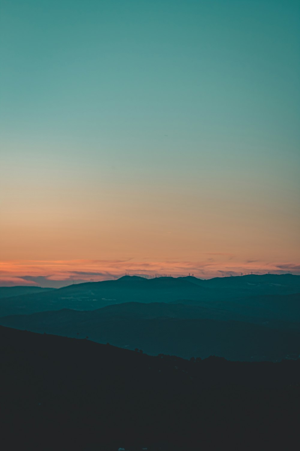 silhouette of mountains during sunset