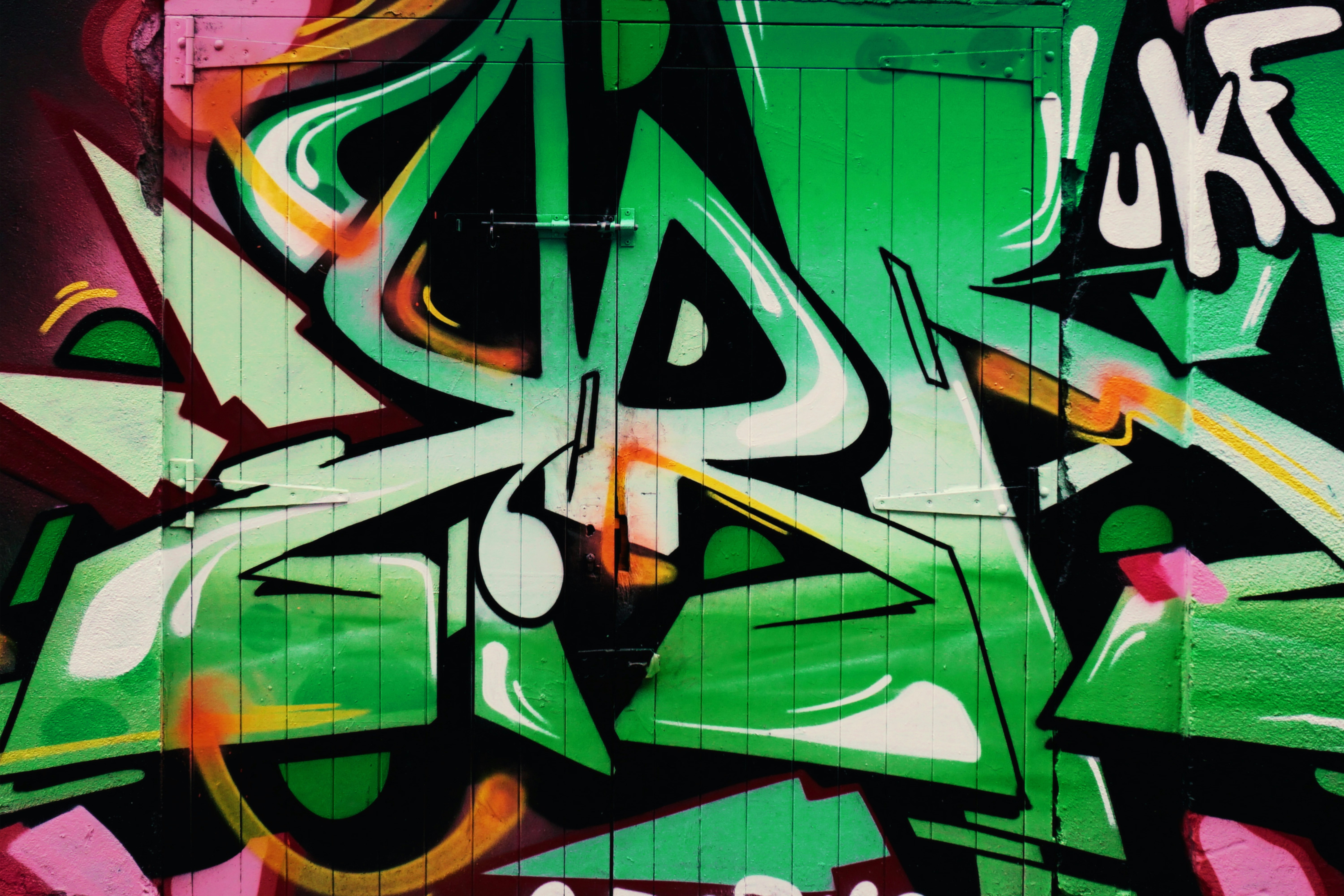 green and brown graffiti art