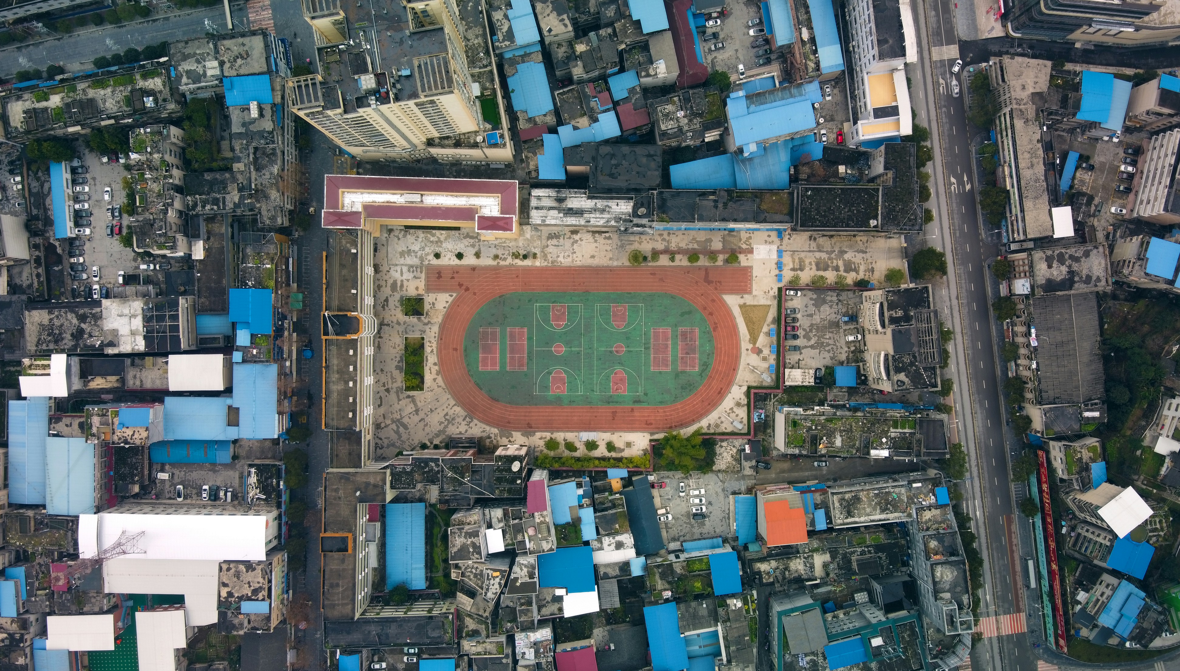 An aerial view of an elementary school in the city of Laifeng, Hubei, China. Shot on DJI Mavic Mini, ISO100, 1/8. Edited using Photoshop.