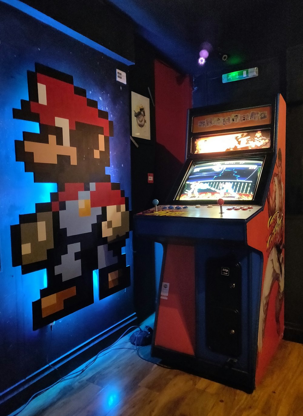 black and red arcade machine