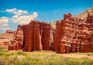 brown rock formation under blue sky during daytime