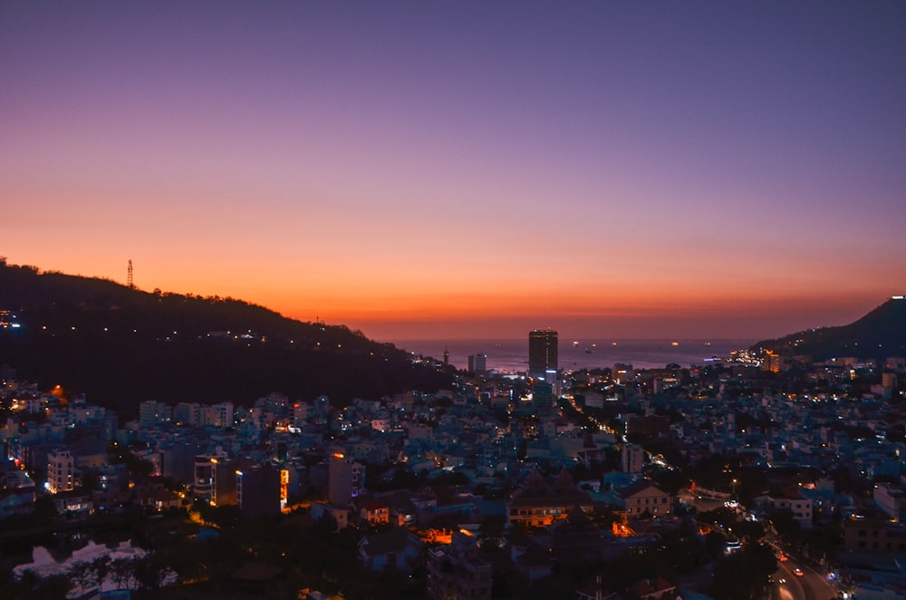 city skyline during night time