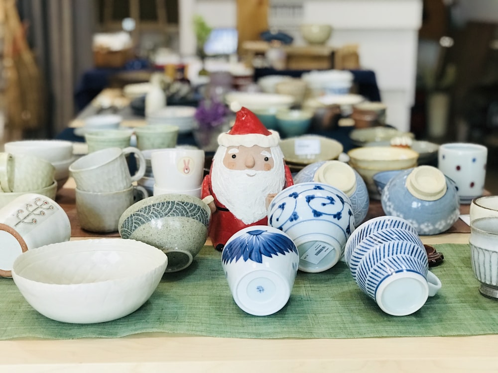 white ceramic snowman figurine on table