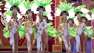 A group of people dressed in theatrical costumes performing on stage.