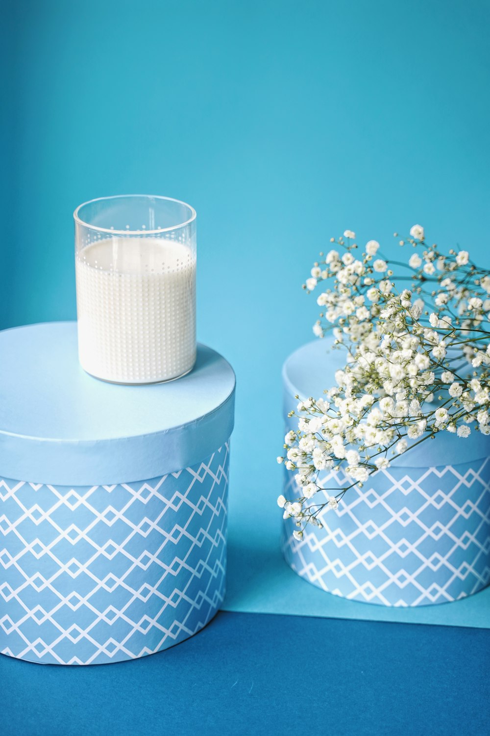 white and blue polka dot candle holder