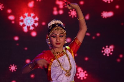 woman in white and red dress wearing white and gold crown