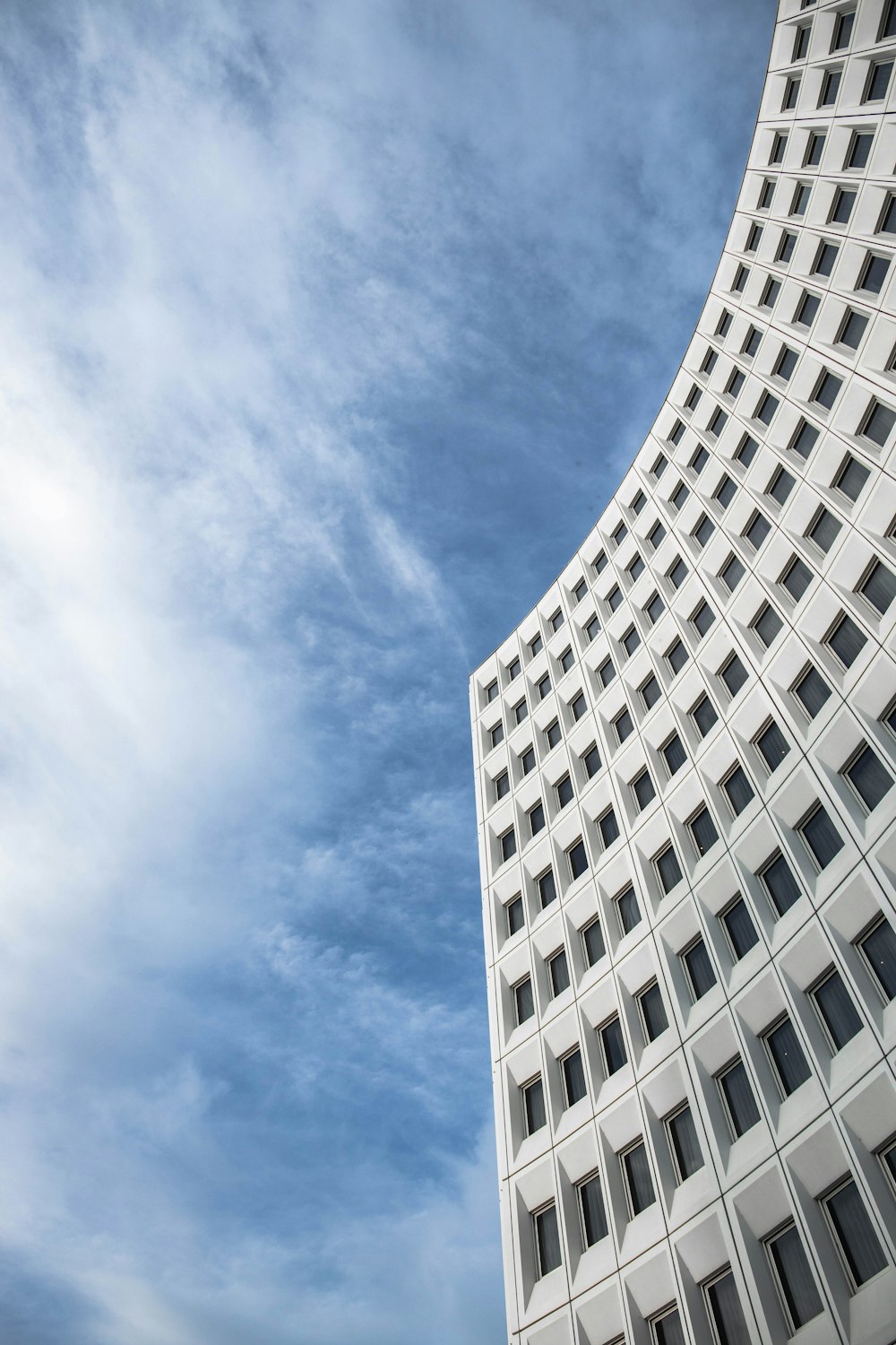 white concrete building under blue sky during daytime