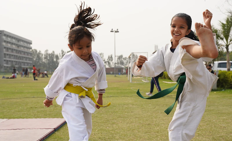 Young student with uncoordinated kick form