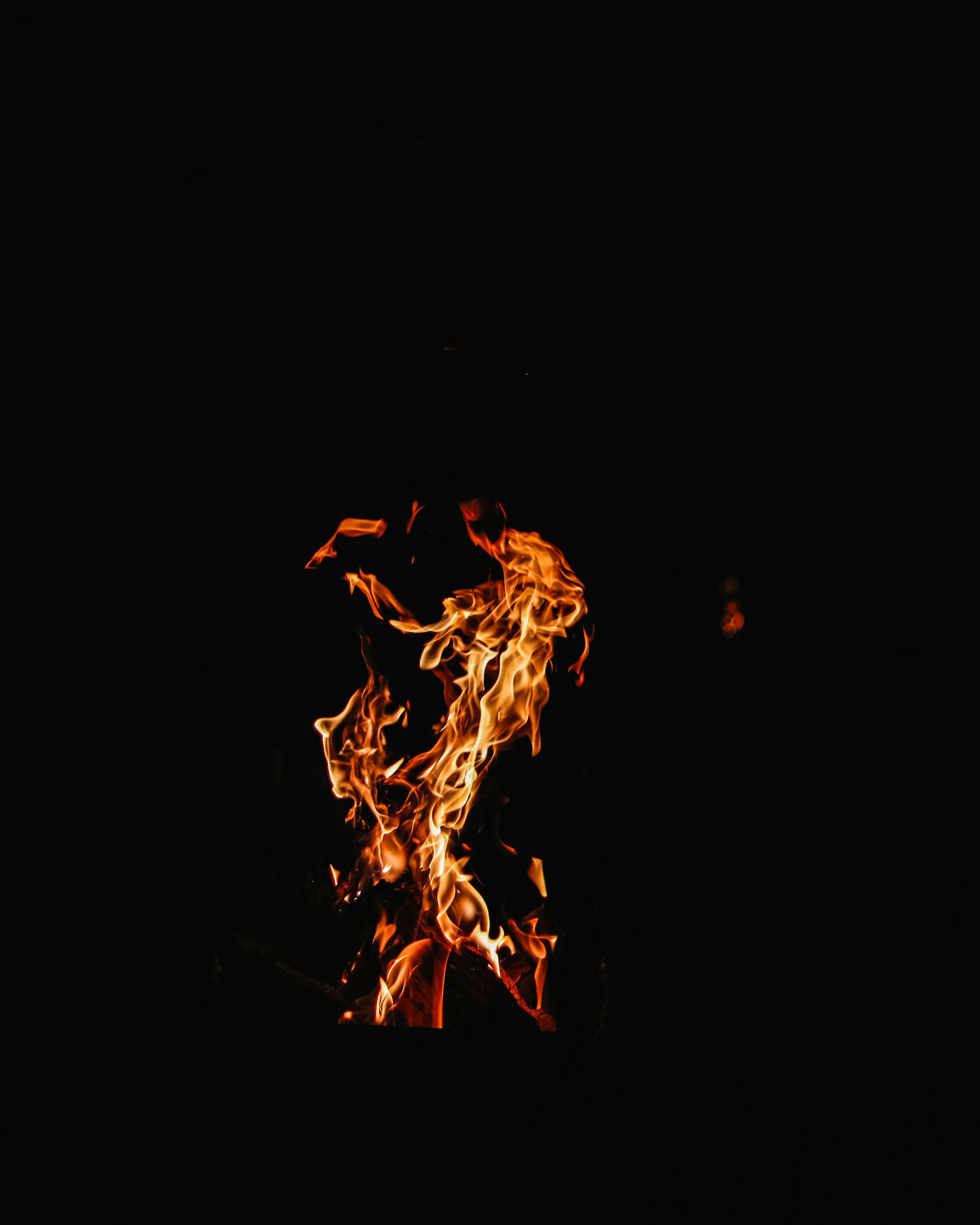 fire in black background with black background