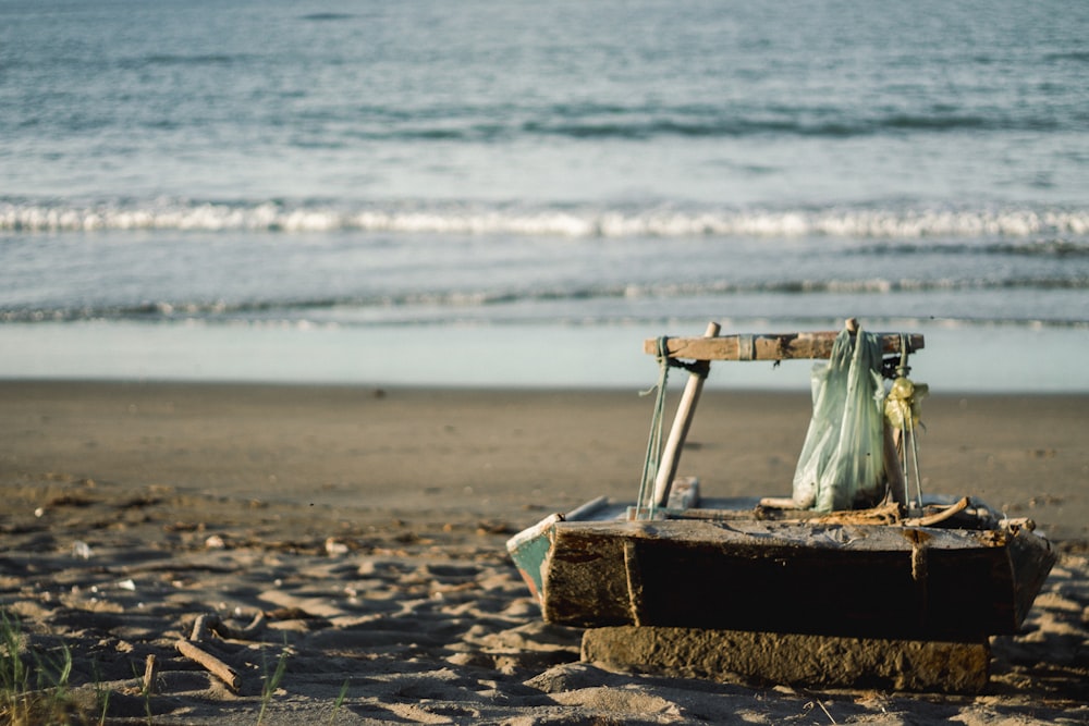 brown wooden ladder on beach shore during daytime