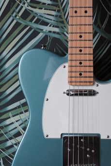 red and white electric guitar