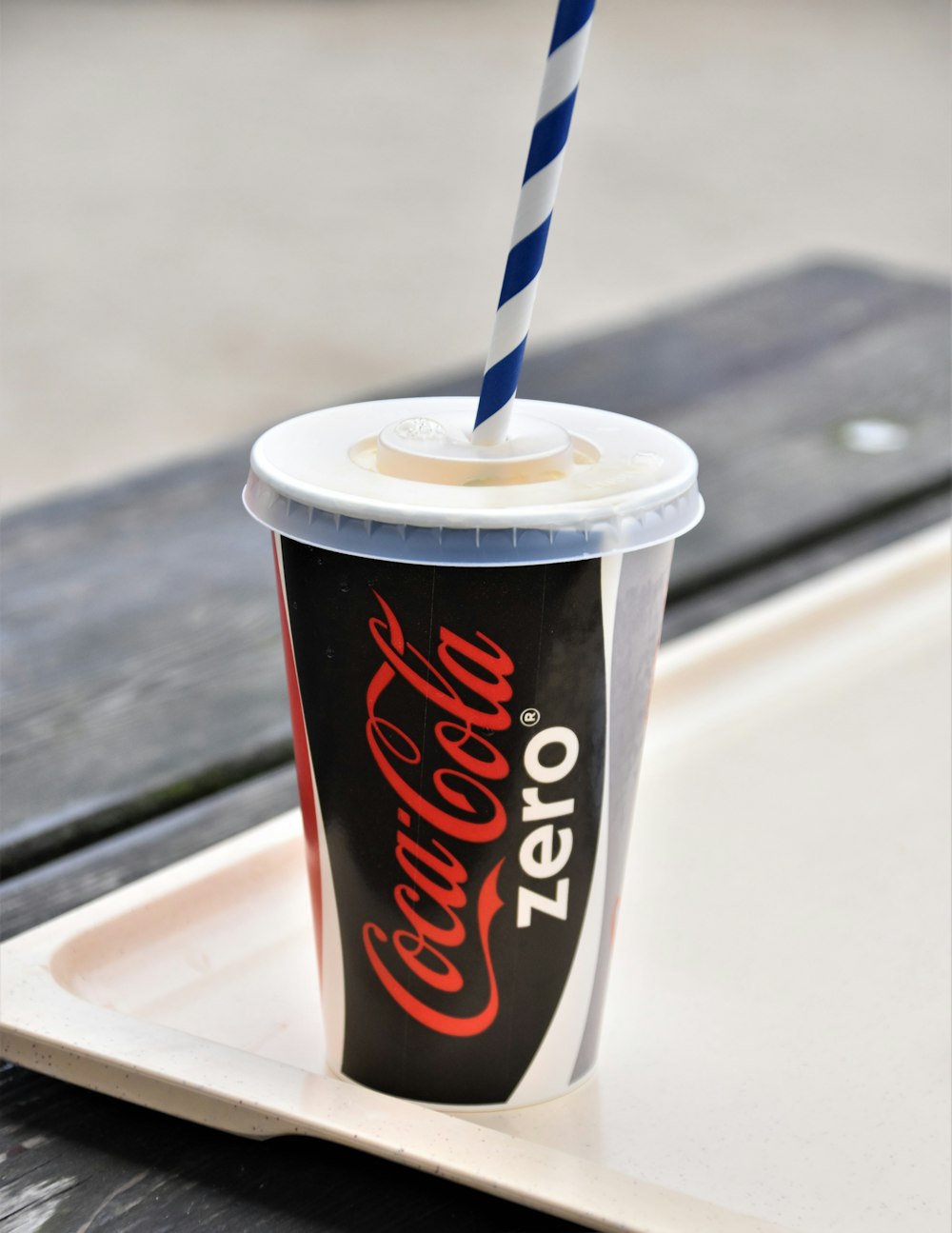 coca cola disposable cup with straw