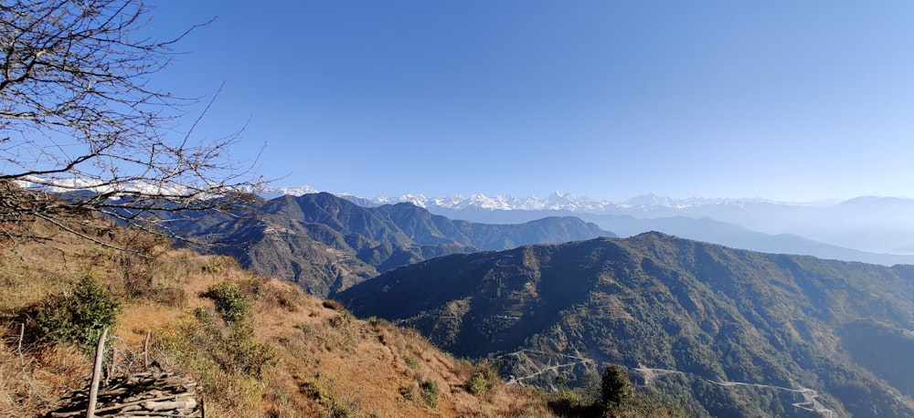 green and brown mountains under blue sky during daytime