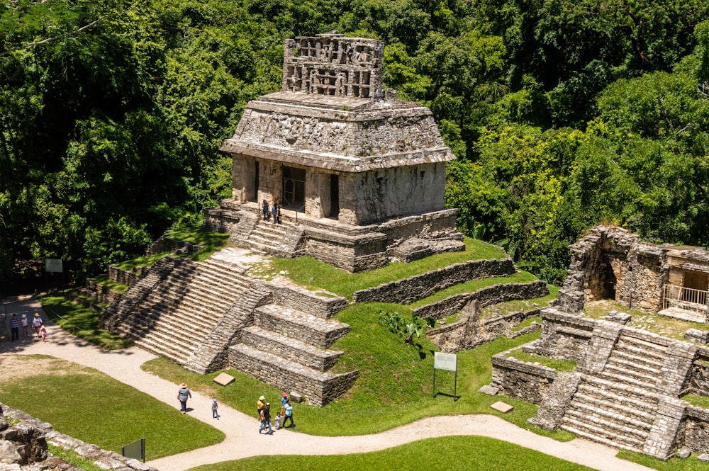 people walking on gray concrete stairs during daytime