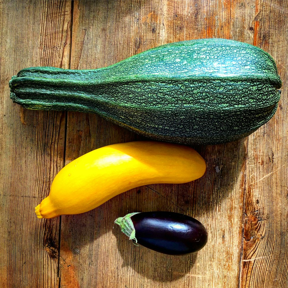 yellow and green vegetable on brown wooden table