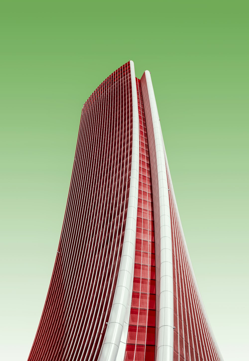 white and red high rise building