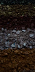 black stones on brown soil