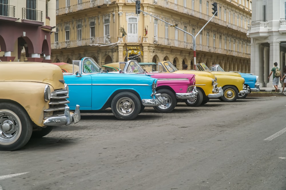 blue and yellow car on road during daytime