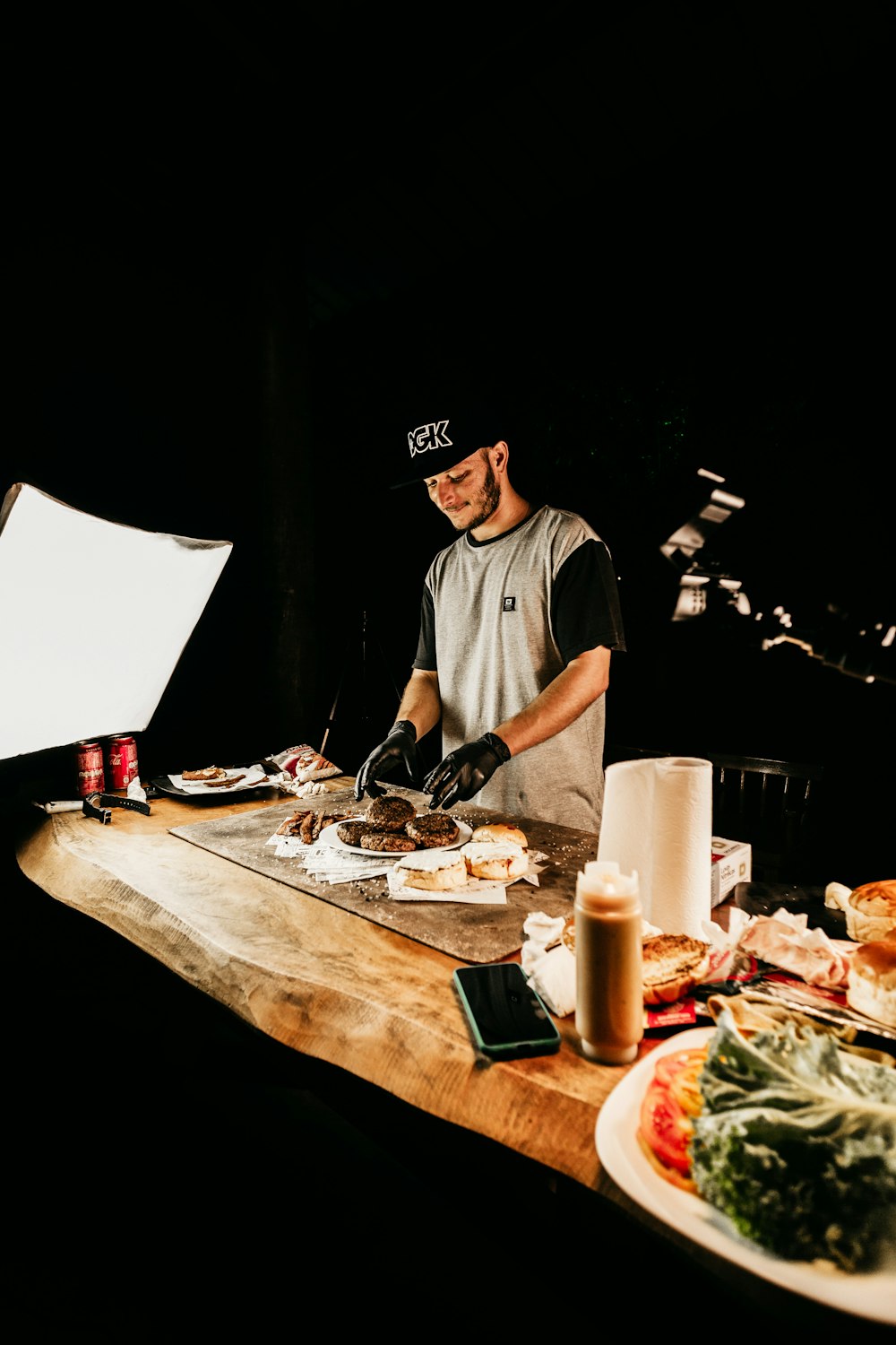 man in white polo shirt sitting at the table