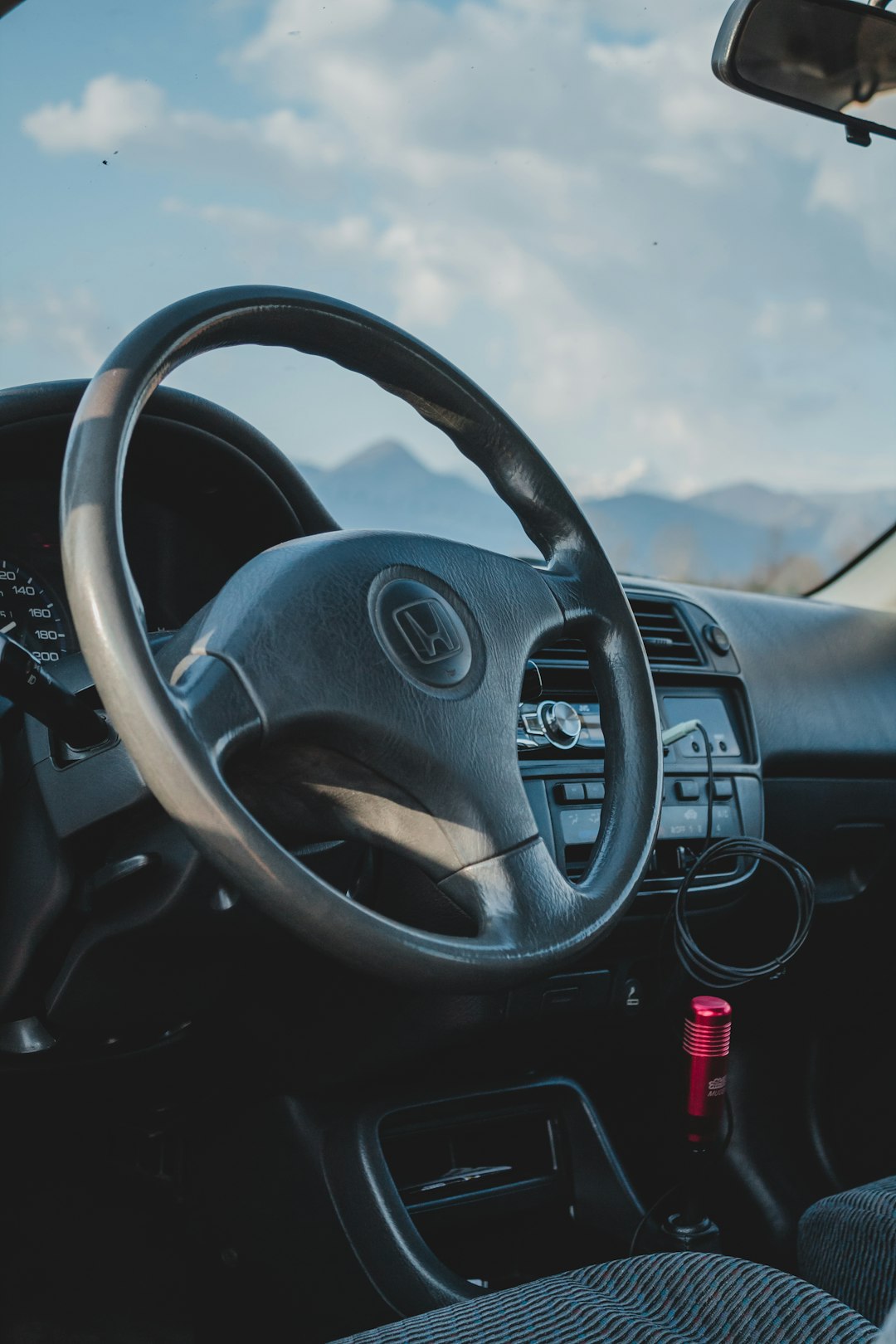 black steering wheel during daytime