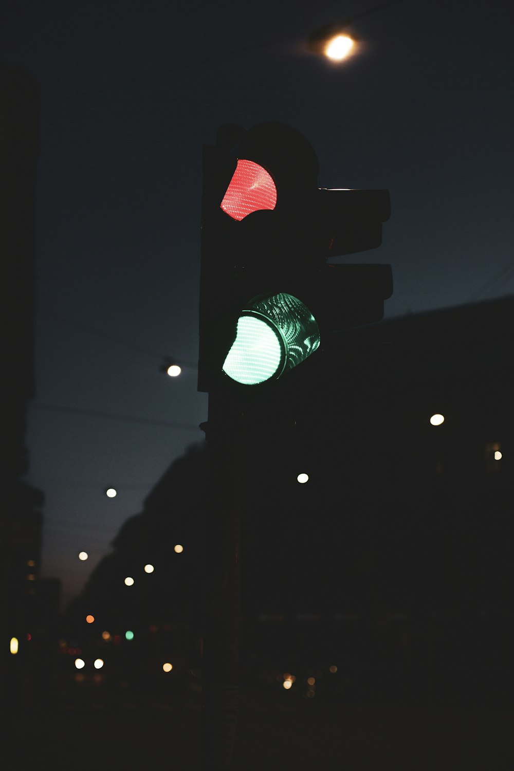 green traffic light during night time