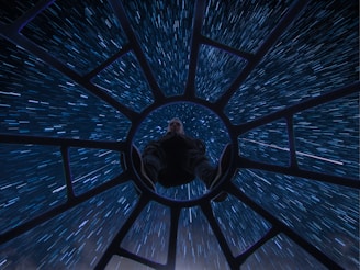 An interactive chair setup with a person experiencing motion simulation.