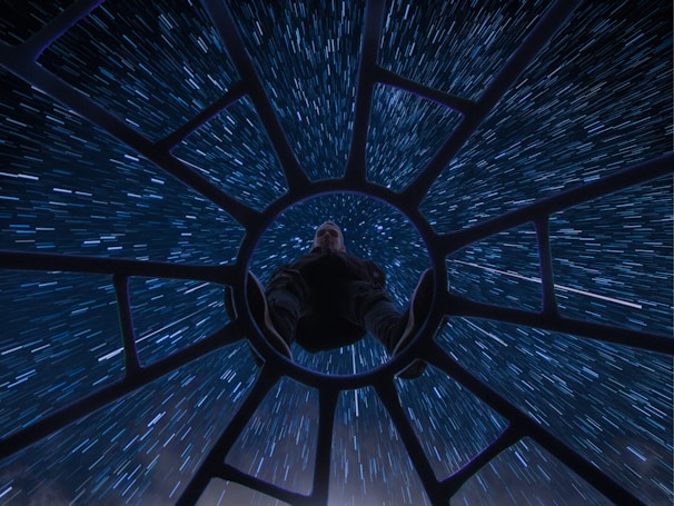 An interactive chair setup with a person experiencing motion simulation.