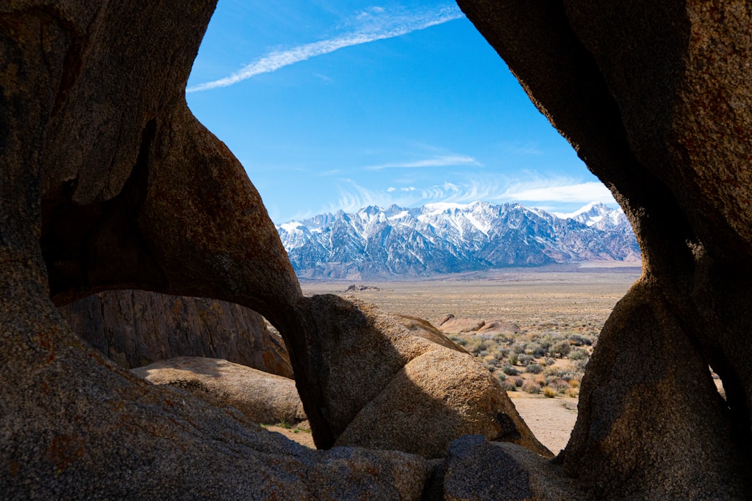 brown rocky mountain under blue sky during daytime