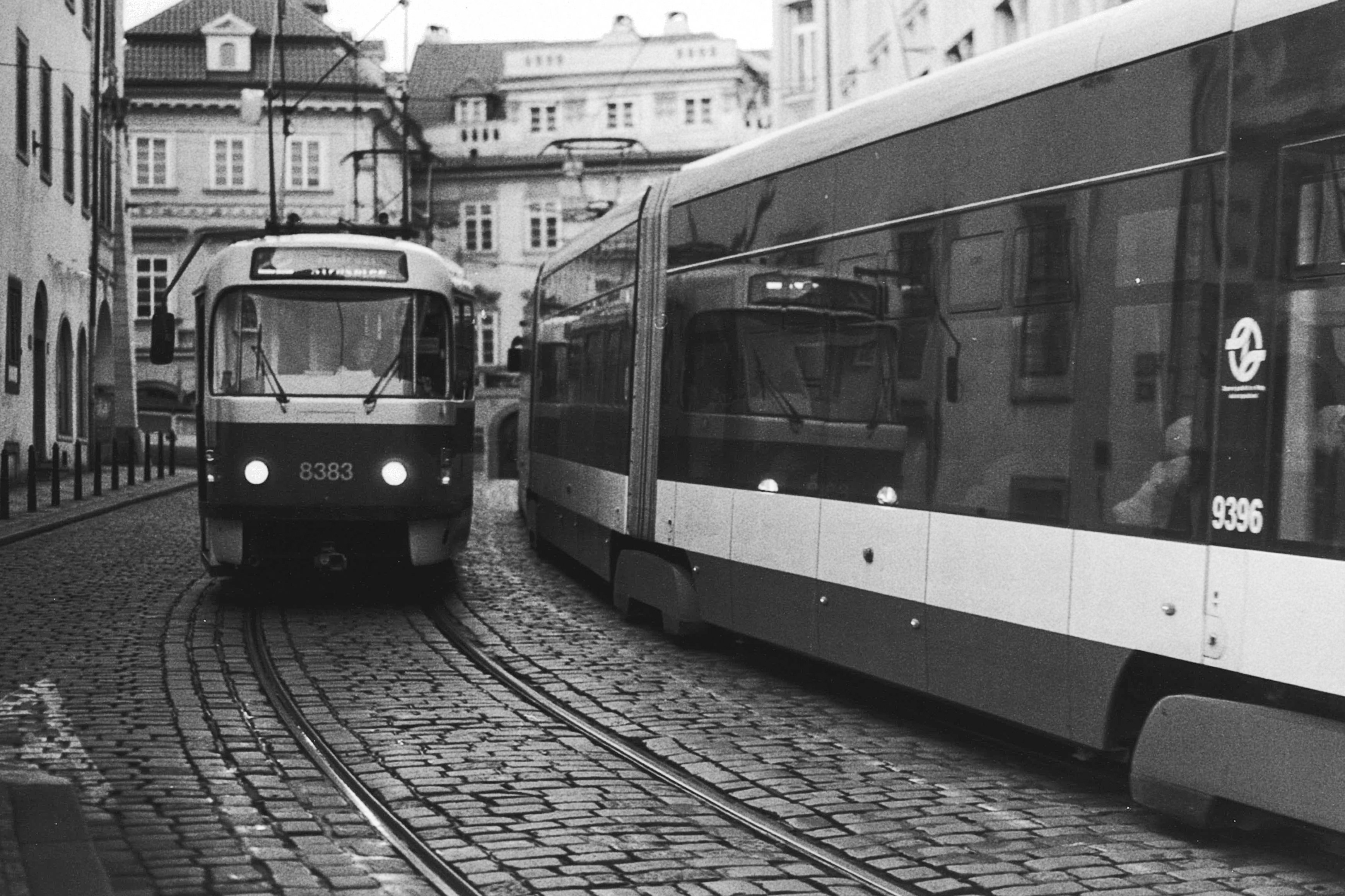 grayscale photo of train on rail road, Trams - new and old. 