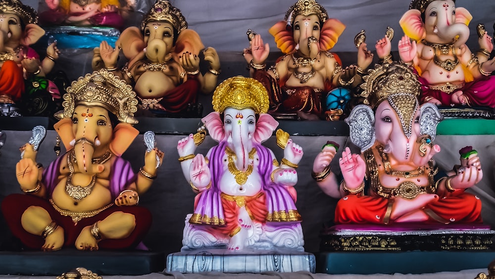 hindu deity figurine on black table