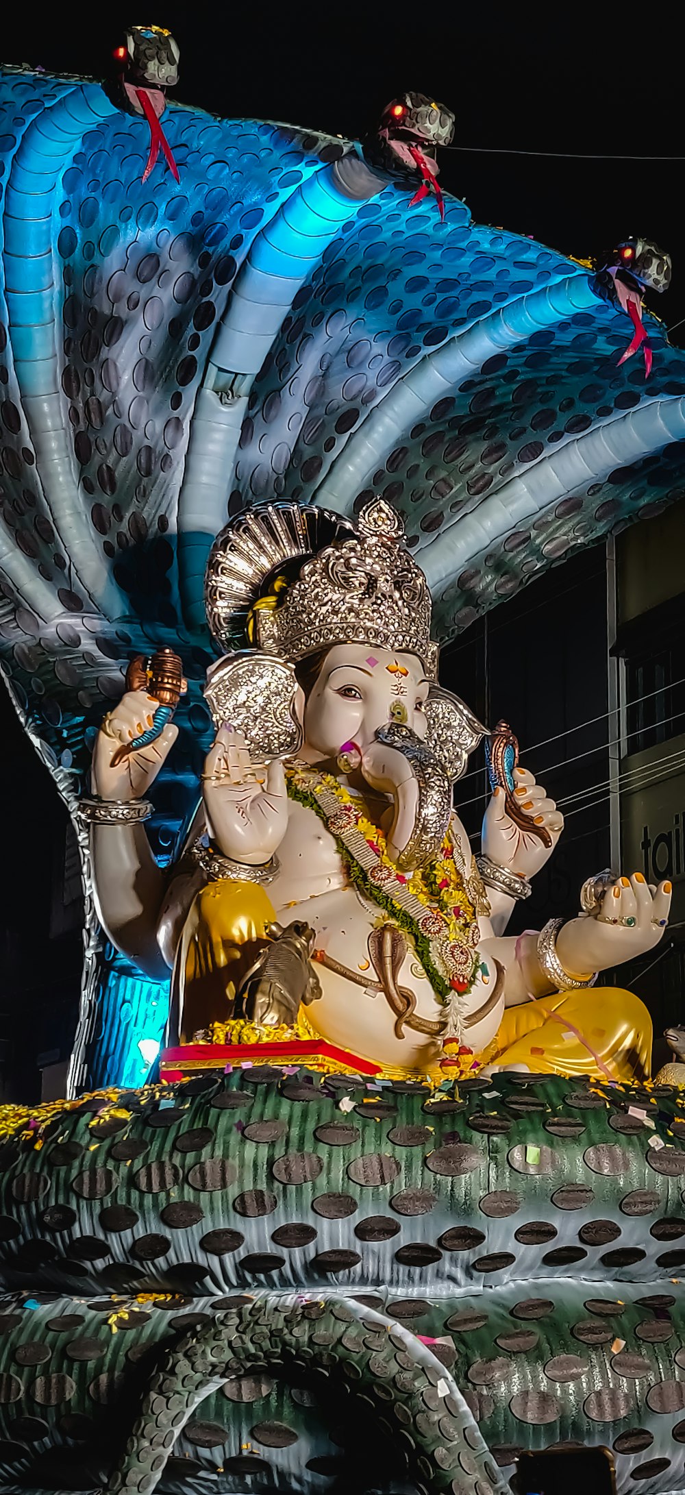 gold and blue hindu deity statue