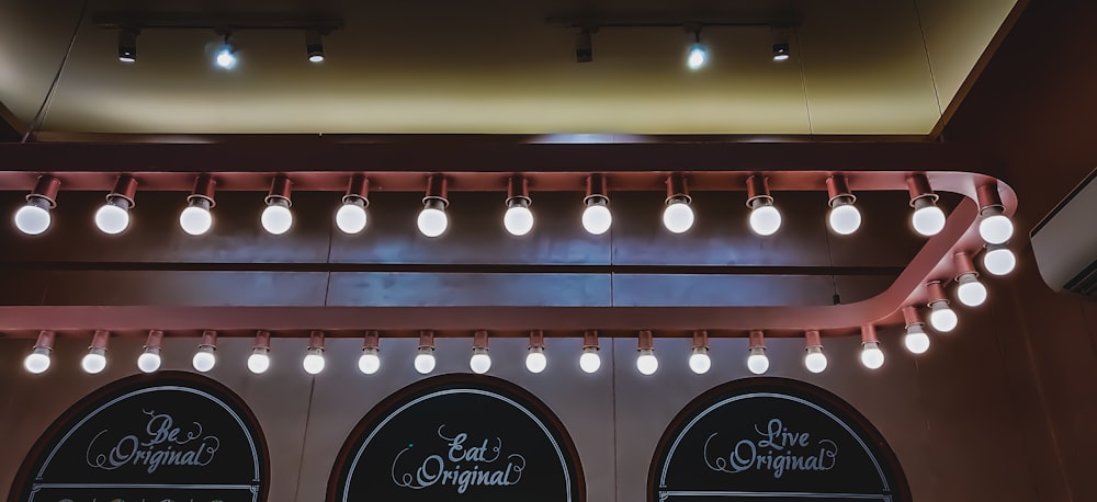 white and brown ceiling with lights